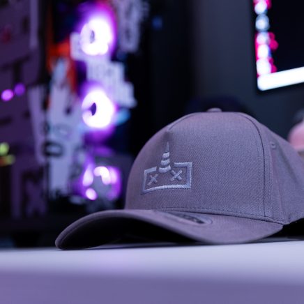 Premium grey UFlex cap with embroidered unicorn logo and adjustable back strap